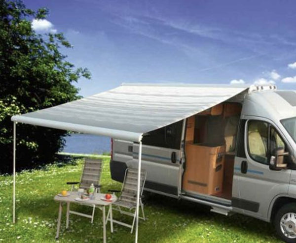 A fixed Thule/Fiamma awning out from the side of a white van.